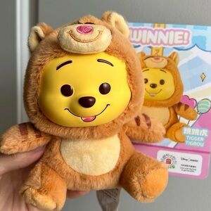 Pooh dressed as Tigger bag charm